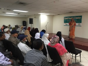 Desi Senior Center's Site Director welcomes our seniors to the special Ramadan event organized by Exit Realty 